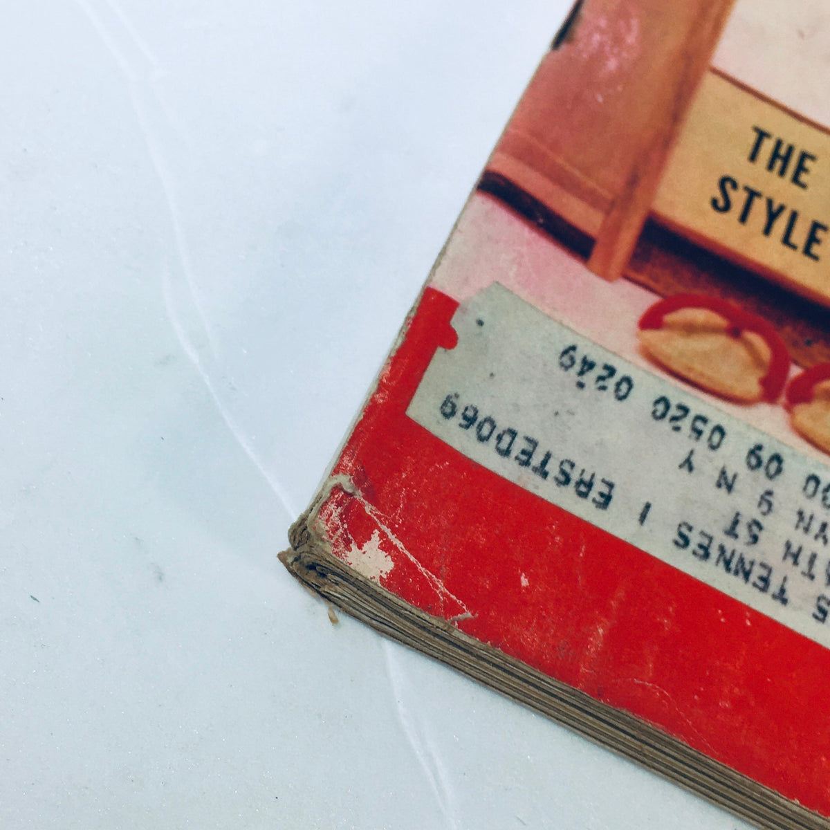 Close-up view of the edge of Vintage Life Magazine May 16 1955, illustrating minor wear and an address label, part of the Kentucky Derby Spectacle and Spring Birds issue.