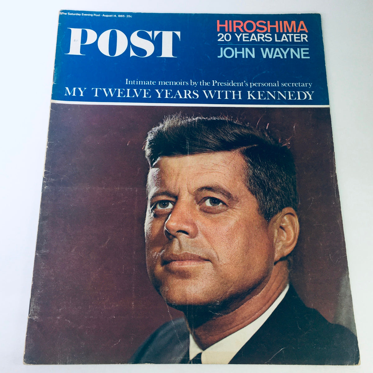 Vintage The Saturday Evening Post cover from August 14, 1965, featuring an intimate portrait of John F. Kennedy, highlighting the article 'My Twelve Years with Kennedy' alongside references to Hiroshima and John Wayne.