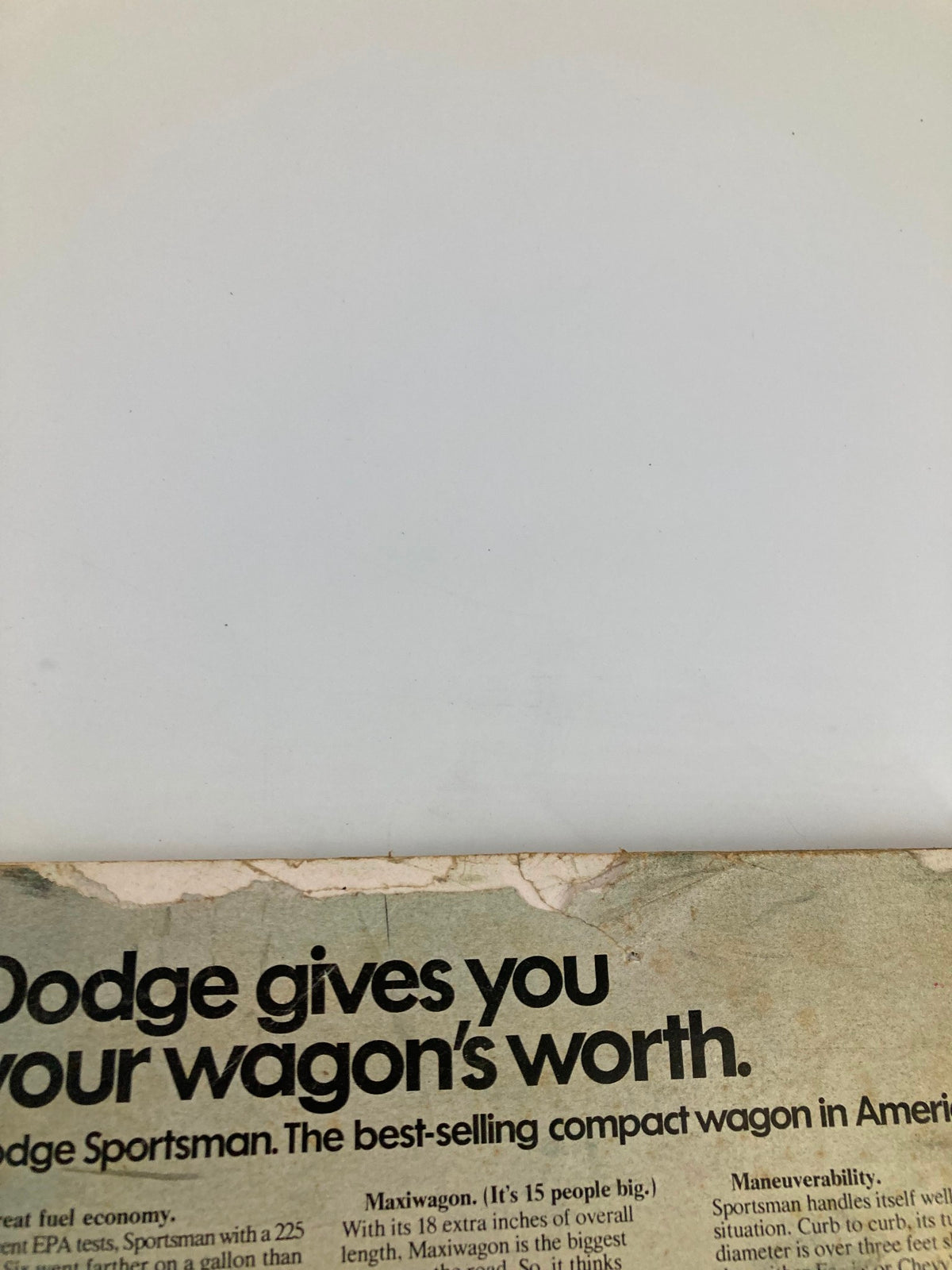 Vintage advertisement from Southern Living Magazine May 1975 showcasing Dodge Sportsman, highlighting its features and promoting the vehicle as the best-selling compact wagon in America. This ad is part of 'The Fresh Faces of Theme Parks' issue, making it a unique collectible for automotive and vintage magazine enthusiasts.