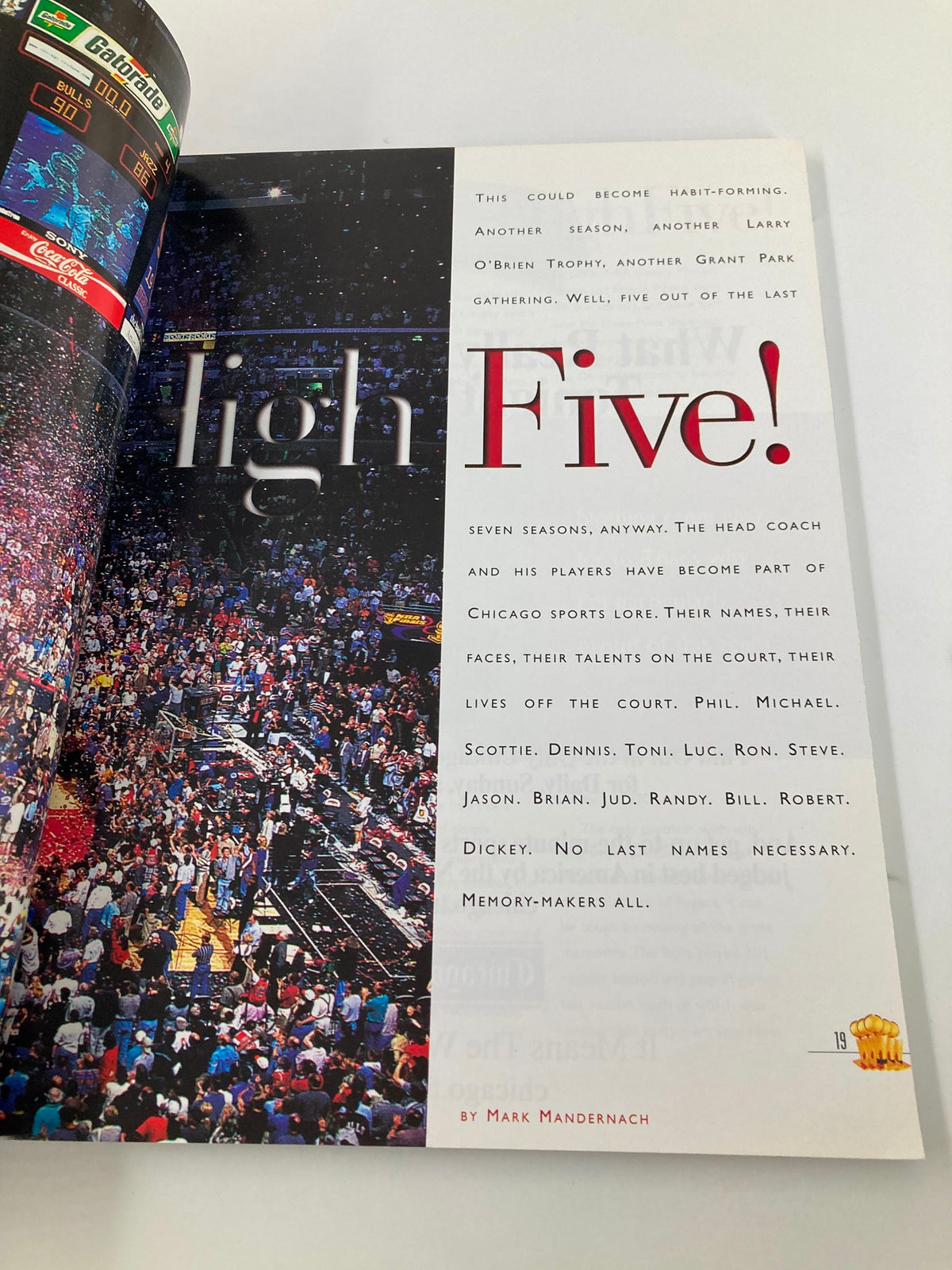 Inside view of the NBA Chicago Bulls Official 1997 - 1998 Yearbook with the phrase 'High Five!' emphasizing the enduring legacy of the team's head coach and players.