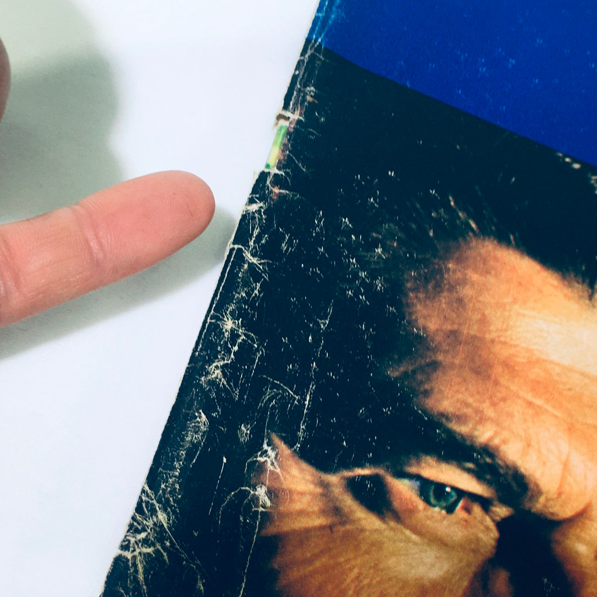 Close-up view of the spine of the VTG Look Magazine from November 1, 1966, showing minor wear and a small rip.