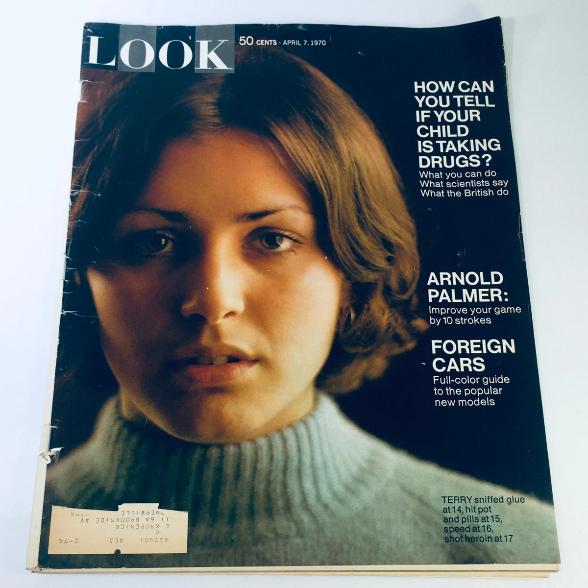 Look Magazine cover from April 7, 1970 featuring a close-up of a young woman. The issue includes headlines about Arnold Palmer, foreign cars, and an article on drug use among kids. Vintage magazine cover highlighting 70s culture.