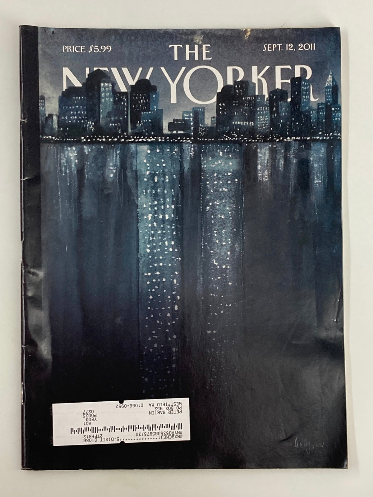 The New Yorker Magazine cover from September 12, 2011, featuring the theme titled 'Reflections' by Ana Juan, showcasing a moody city skyline with lights reflecting on water.
