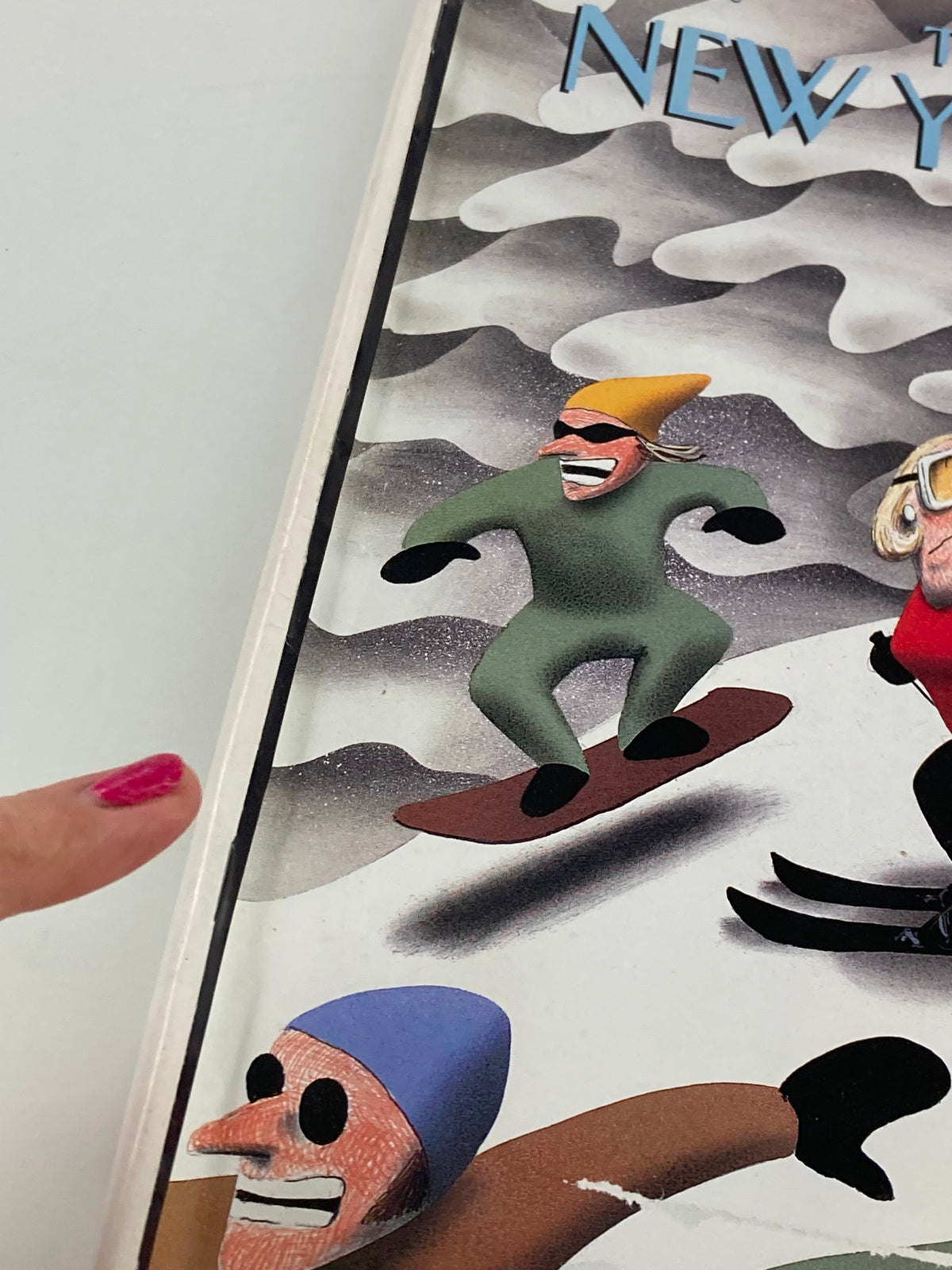 Close-up of the cover of The New Yorker Magazine January 25, 1999, highlighting details of 'Down the Hill' by Ian Falconer, with colorful characters enjoying winter sports.