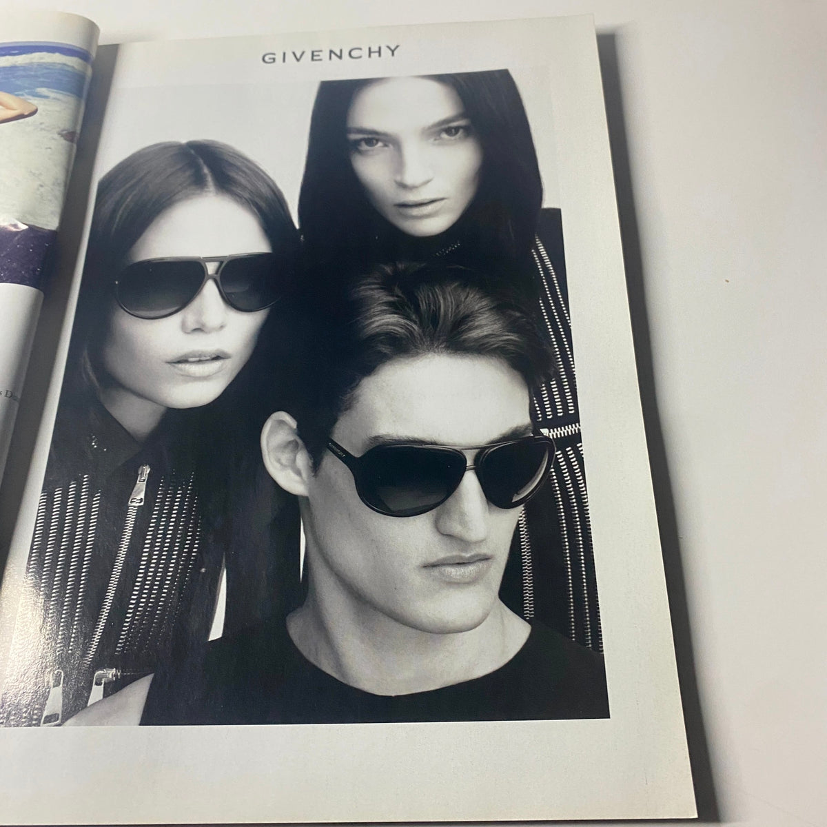 Advertorial for Givenchy from Harper's Bazaar UK Magazine May 2011 showcasing three models in stylish sunglasses, emphasizing contemporary fashion.