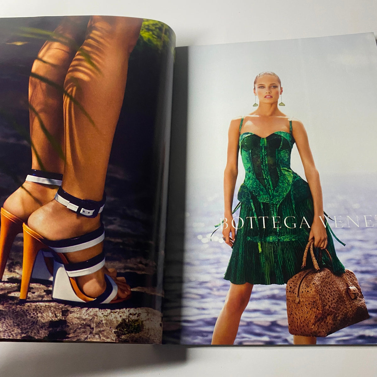 Harper's Bazaar UK Magazine February 2012 Uma Thurman Cover No Label VG features an advertisement for Bottega Veneta showcasing a model in a striking green dress alongside fashionable sandals.