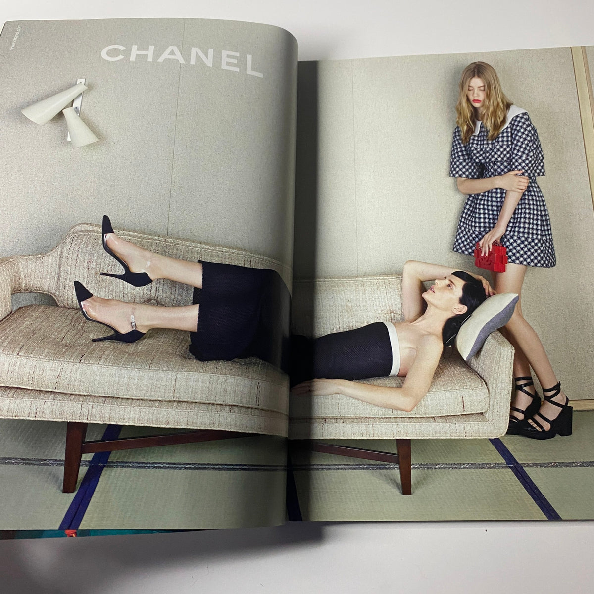 Chanel advertisement presenting models in elegant clothing and accessories, featured in the April 2013 issue of Harper's Bazaar UK with Kate Winslet on the cover.