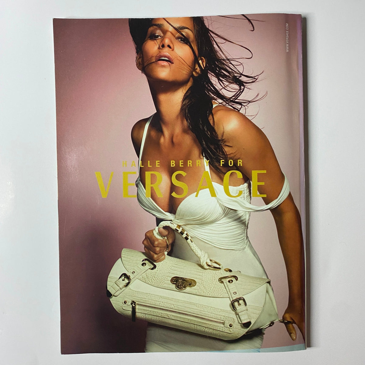 Cover of Harper's Bazaar Magazine February 2006 featuring Salma Hayek, showcasing high-fashion editorial photography by Peter Lindbergh, in good condition with vibrant fashion coverage.