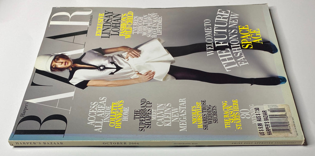 Back cover of Harper's Bazaar Australia Magazine, October 2006 highlighting Lindsay Lohan, with a stylish fashion editorial layout and promotional messages.