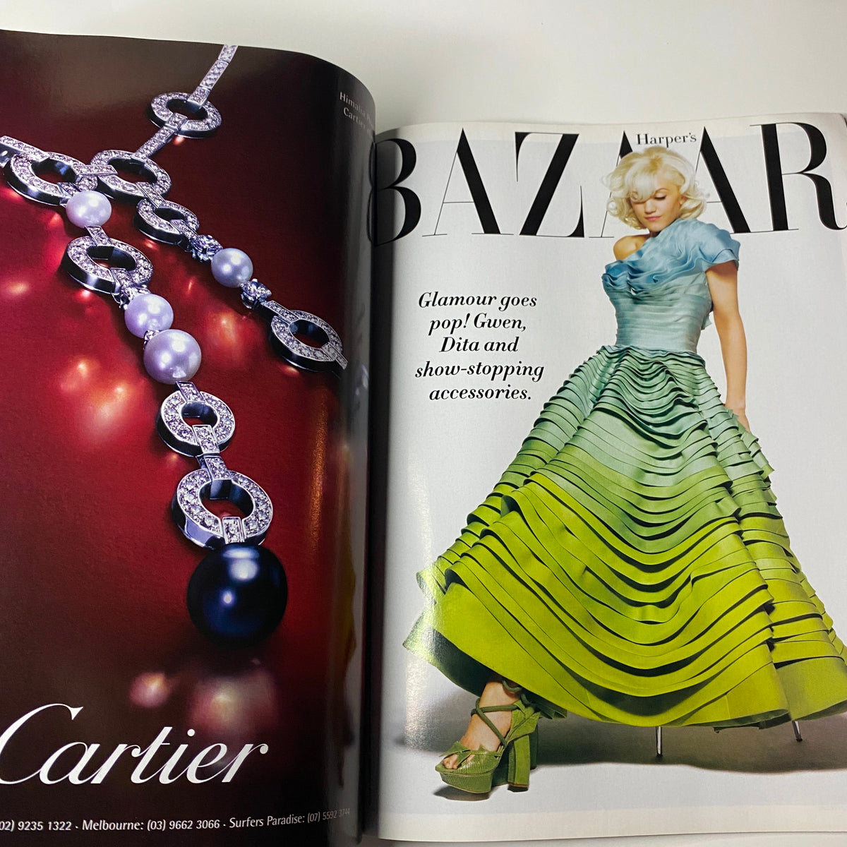 Harper's Bazaar Australia Magazine June - July 2007 featuring a Cartier advertisement with a stunning close-up of a pearl necklace and a vibrant fashion illustration of a woman in a green dress.
