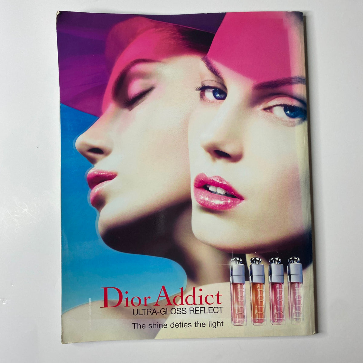 Harper's Bazaar Australia Magazine June - July 2007 showcasing a Dior Addict advertisement highlighting glossy lip products against a striking dual-tone background of a model's face.