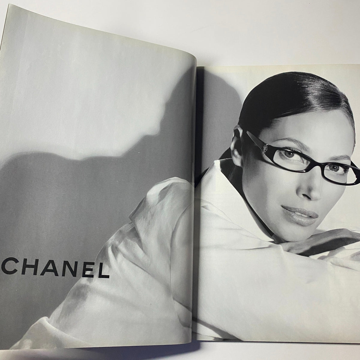 Harper's Bazaar British Magazine January 2008 spread featuring a black and white advertisement for Chanel, highlighting the elegance and sophistication of the brand.