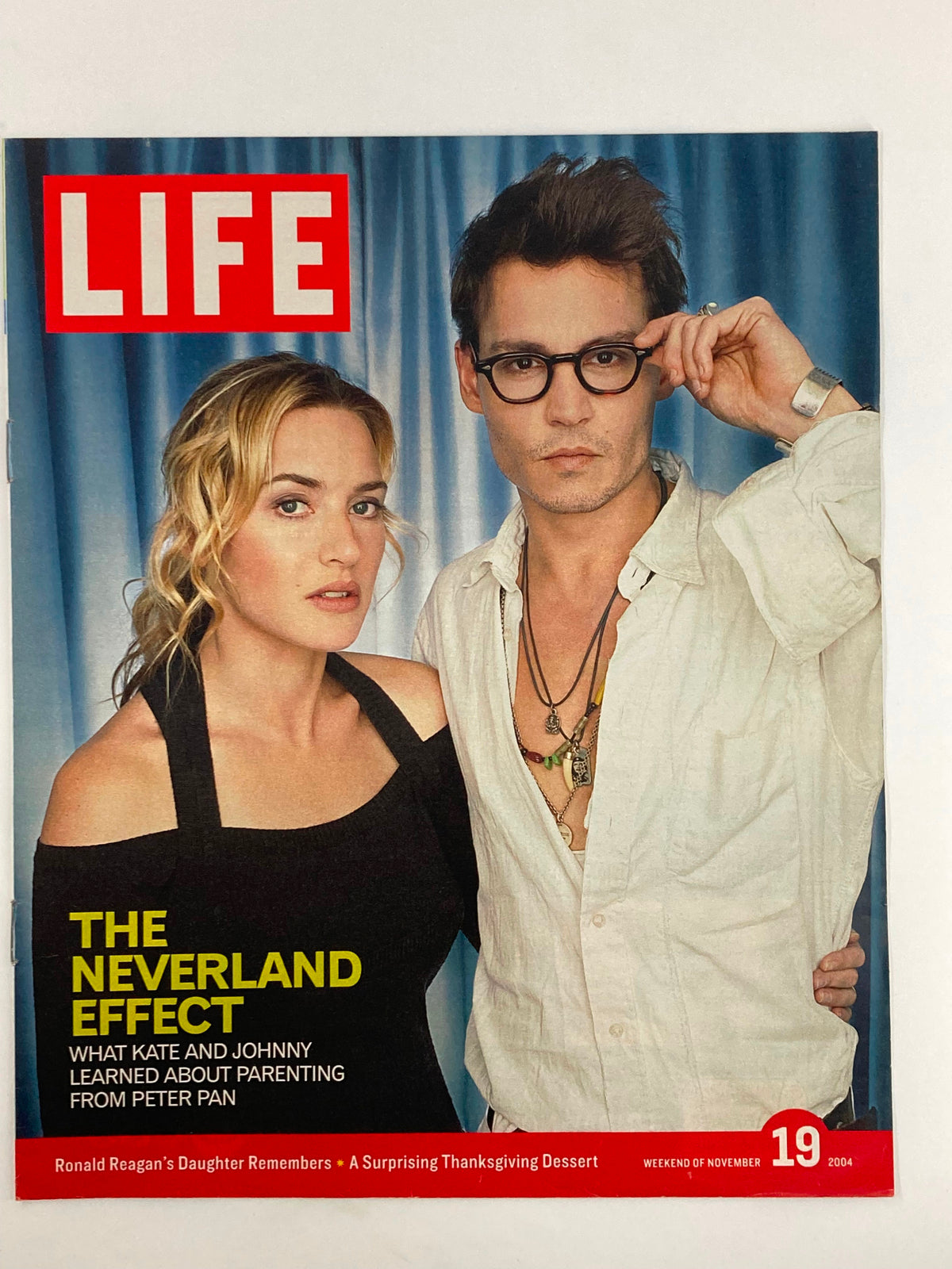 Life Magazine Newspaper Insert featuring Kate Winslet and Johnny Depp on the cover, November 19, 2004, highlighting their discussion on parenting and the film industry.