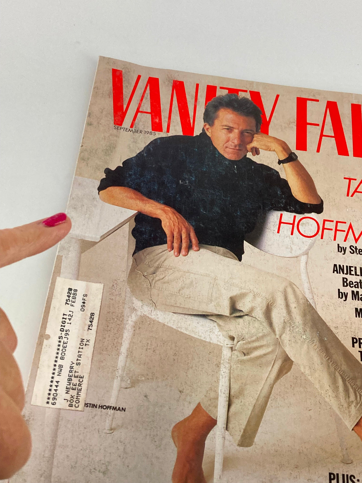 Close-up of the September 1985 Vanity Fair magazine cover with Dustin Hoffman, showcasing the title 'Tales of Hoffman' and other featured articles.