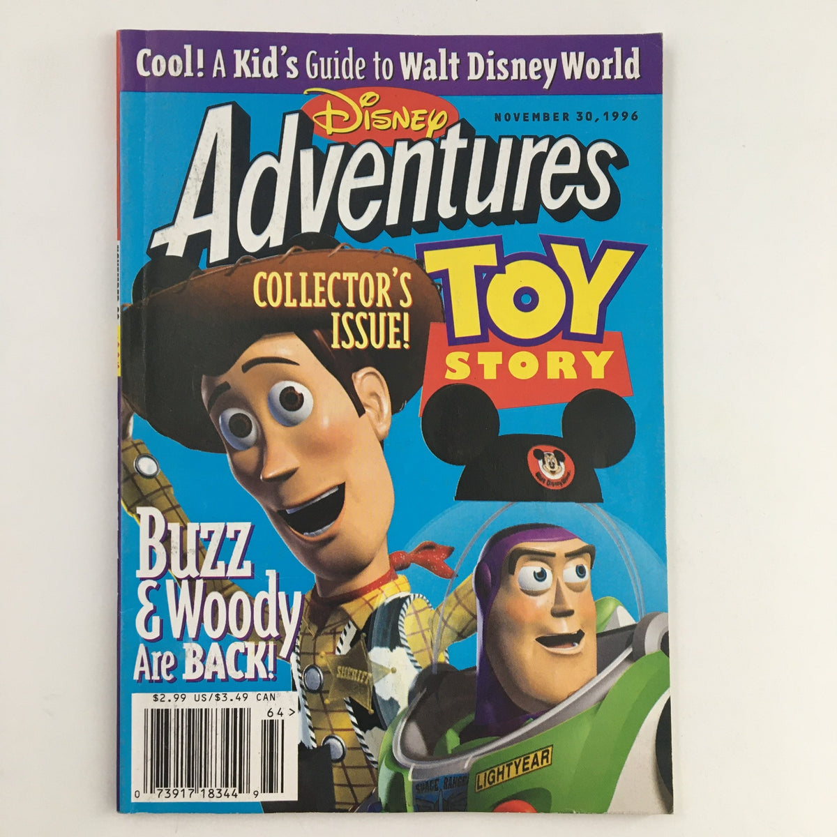 Disney Adventures Magazine November 30 1996 featuring Buzz and Woody on the cover, a collectible issue celebrating Toy Story, showcasing vibrant colors and nostalgic Disney themes.