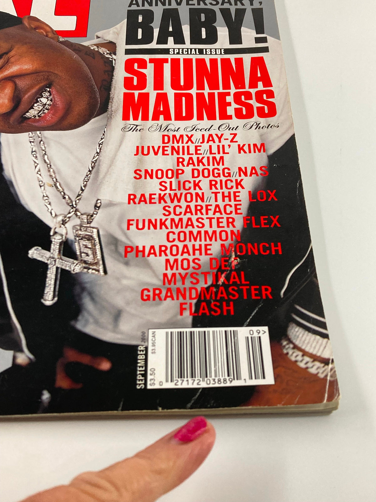 Another close-up of the XXL Magazine September 2000 cover, showcasing the bold red and black text detailing various hip-hop artists including Snoop Dogg and Common.