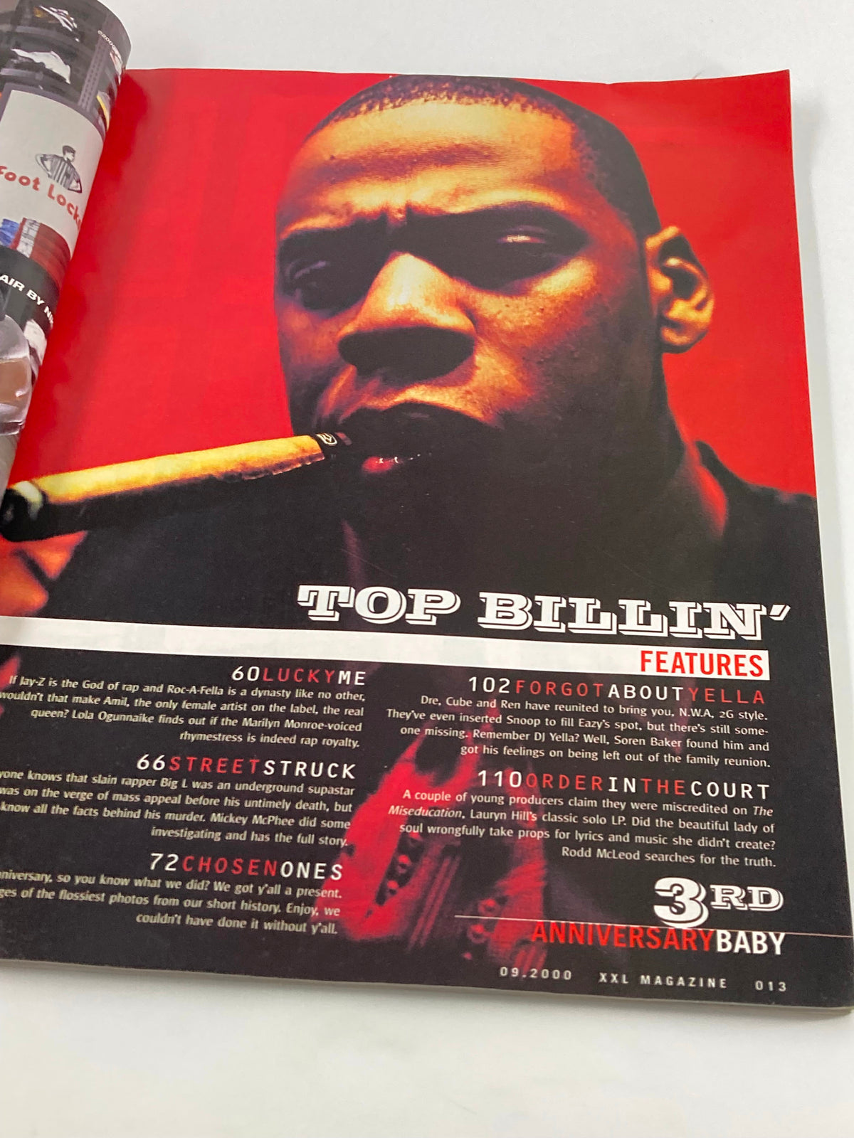Inside page of XXL Magazine September 2000 featuring Jay-Z with a confident expression and a cigar, highlighting the section titled 'TOP BILLIN' with various features related to hip-hop culture.