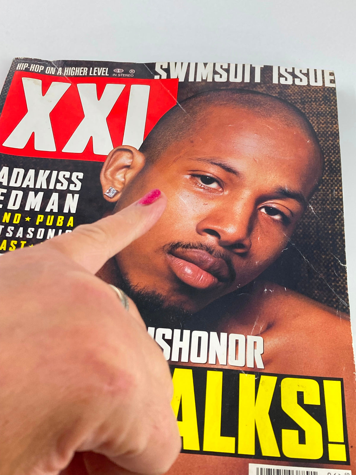 Close-up of the XXL Magazine June 2001 cover with a focus on Shyne, displaying the message 'Death Before Dishonor' and promotional content.
