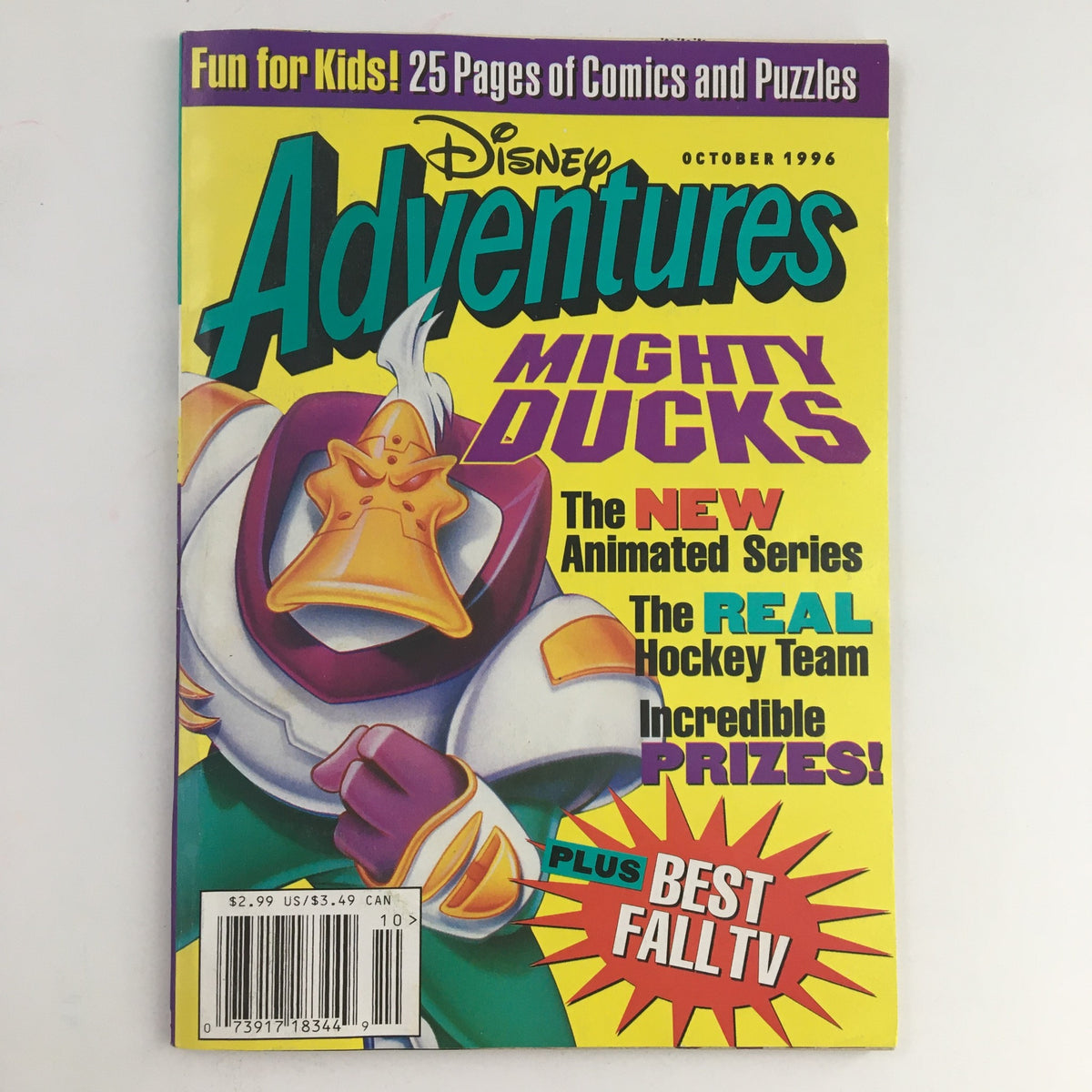 Disney Adventures Magazine cover from October 1996 featuring the Mighty Ducks Animated Series, showcasing vibrant colors and playful graphics. The magazine includes text highlighting the new animated series, the real hockey team, and promises of fun activities for kids.