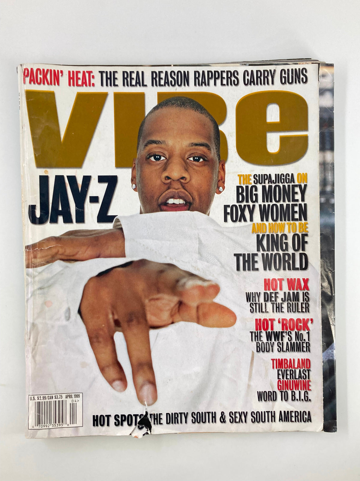 Cover of Vibe Magazine April 1999 featuring Jay-Z, highlighting themes of big money and foxy women, showcasing the influential era of hip-hop culture.