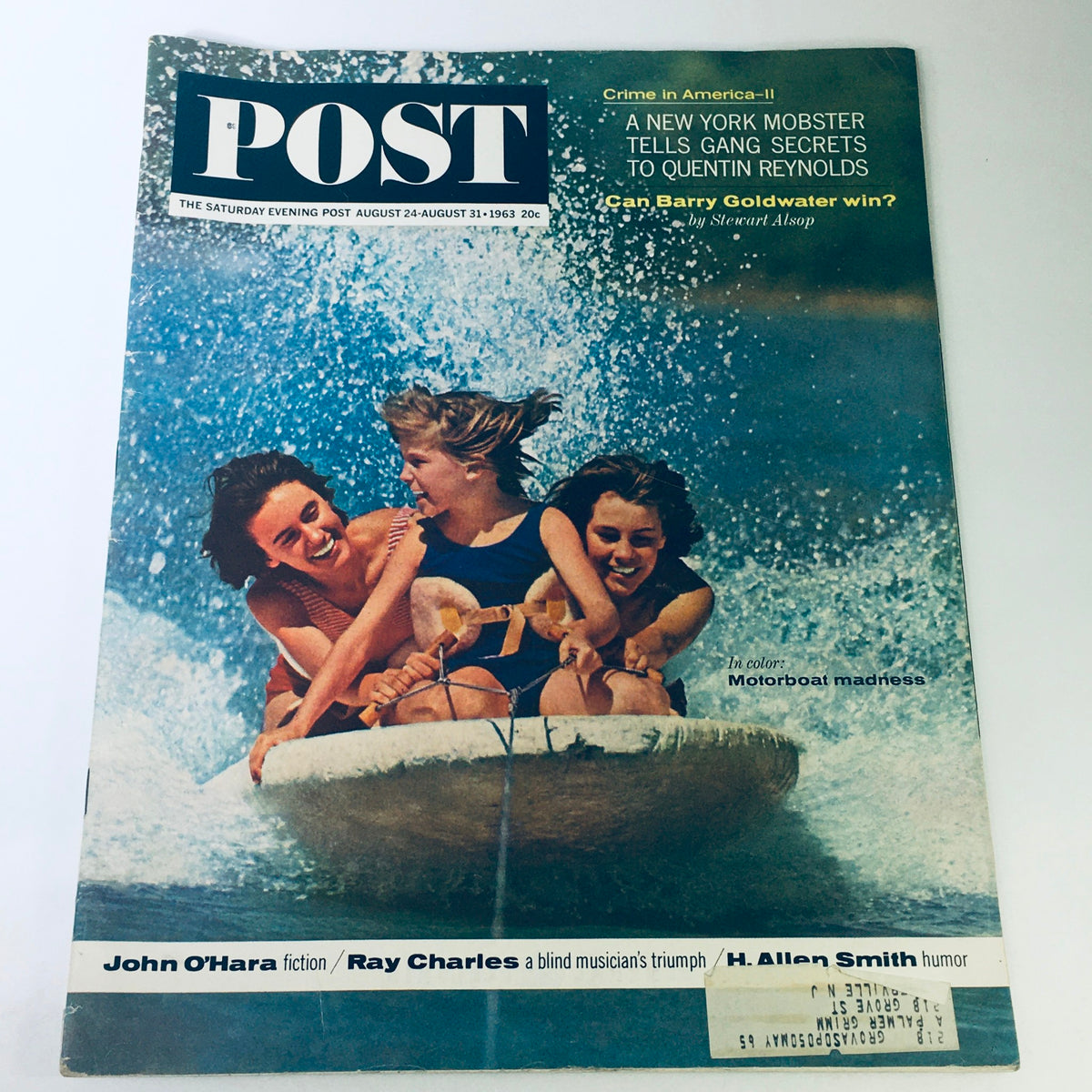 Vintage cover of The Saturday Evening Post from August 24-31, 1963, featuring a vibrant image of three girls enjoying motorboating. Includes articles by John O'Hara and a profile of Ray Charles, showcasing the cultural essence of the early 1960s.
