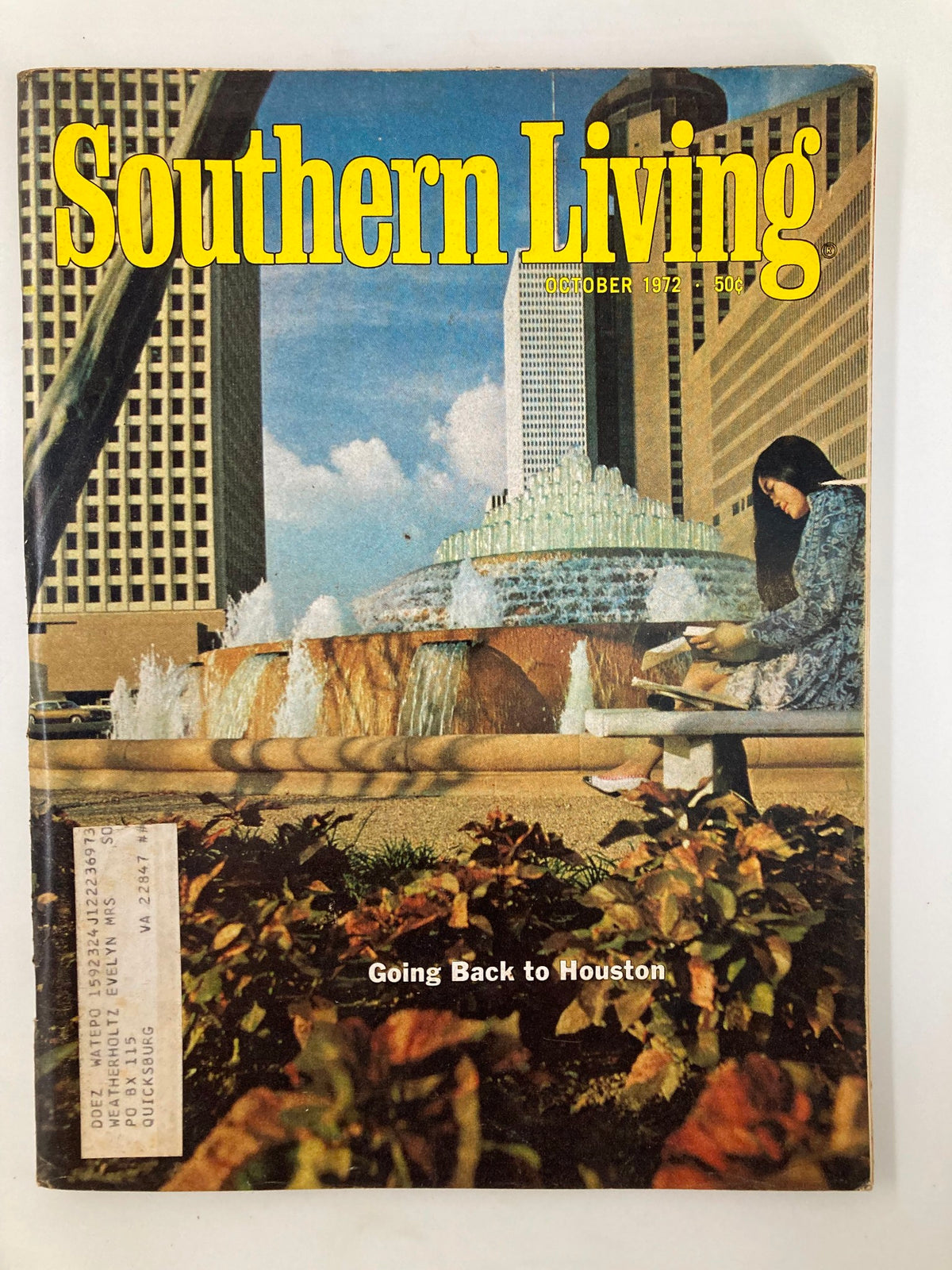Cover of the VTG Southern Living Magazine from October 1972 featuring the title prominently displayed. The image showcases a serene scene with a fountain and a woman reading on a bench, reflecting the essence of Southern culture.