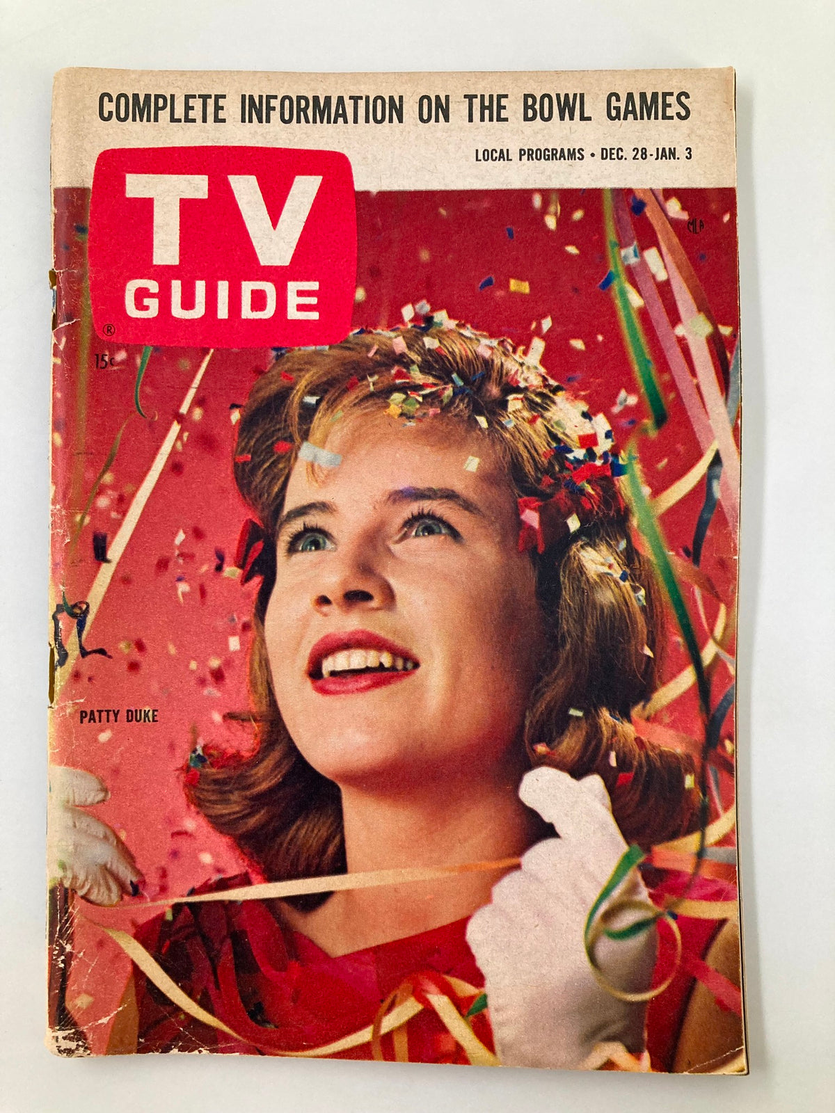 TV Guide Magazine December 28 1963 featuring Patty Duke on the cover, showcasing her in a festive outfit with confetti, reflecting classic 1960s television culture.
