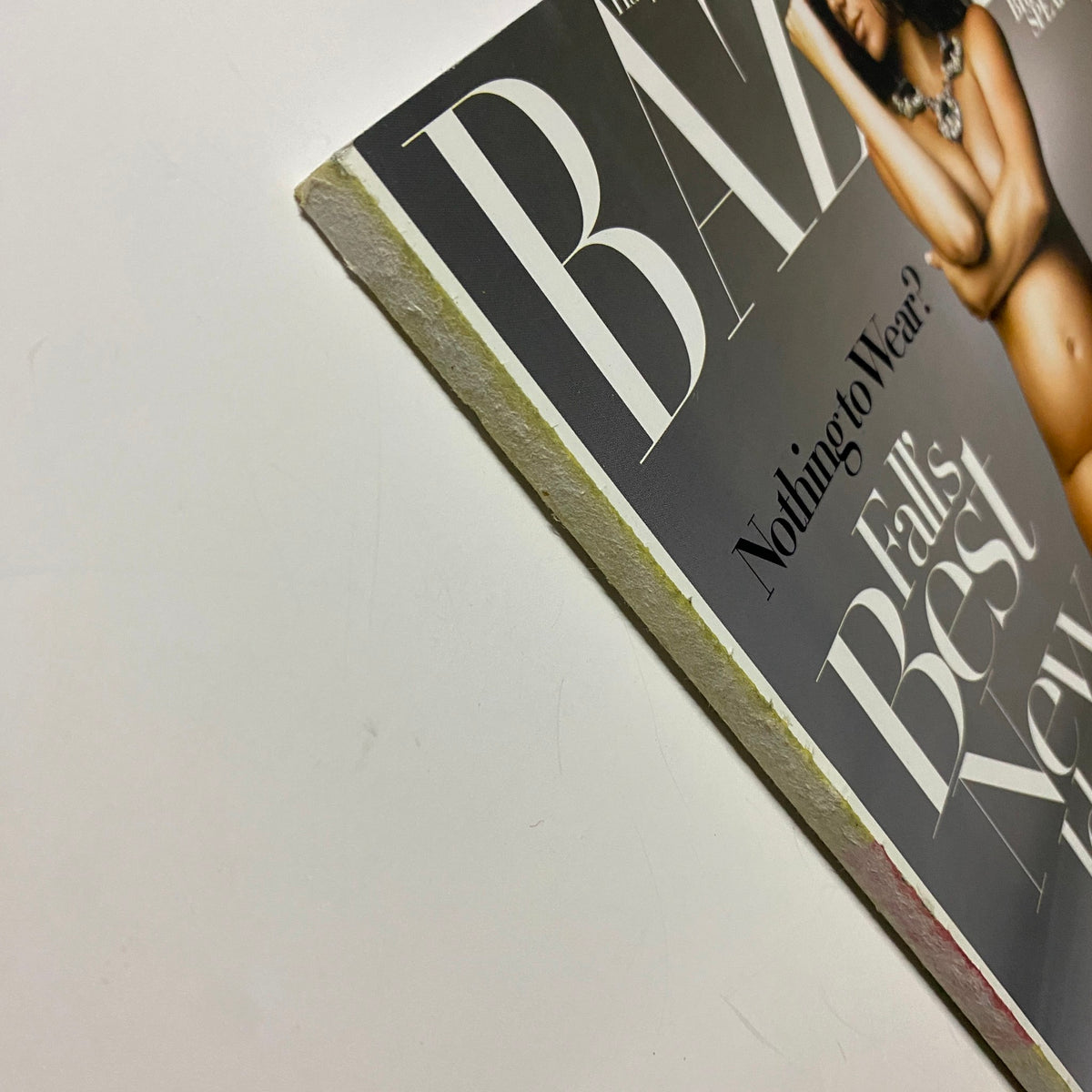 Close-up of the edge of Harper's Bazaar Magazine August 2006 featuring Britney Spears. The magazine showcases fall fashion insights with 'Best New Ideas Inside'.
