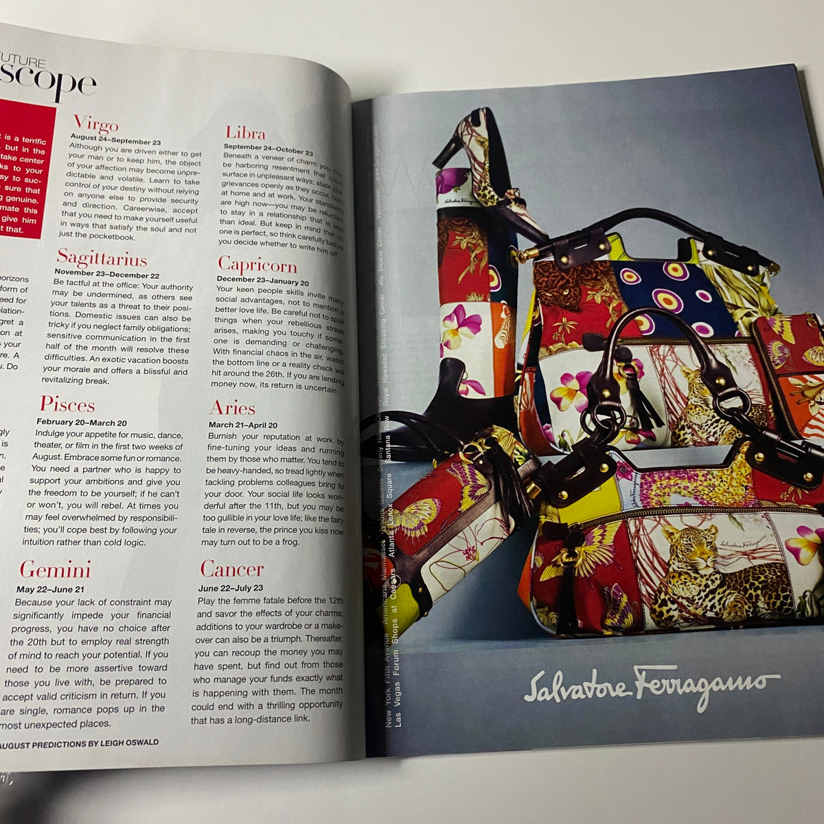 Horoscope section in Harper's Bazaar Magazine August 2006, accompanied by Salvatore Ferragamo handbag advertisement, displaying colorful designs.