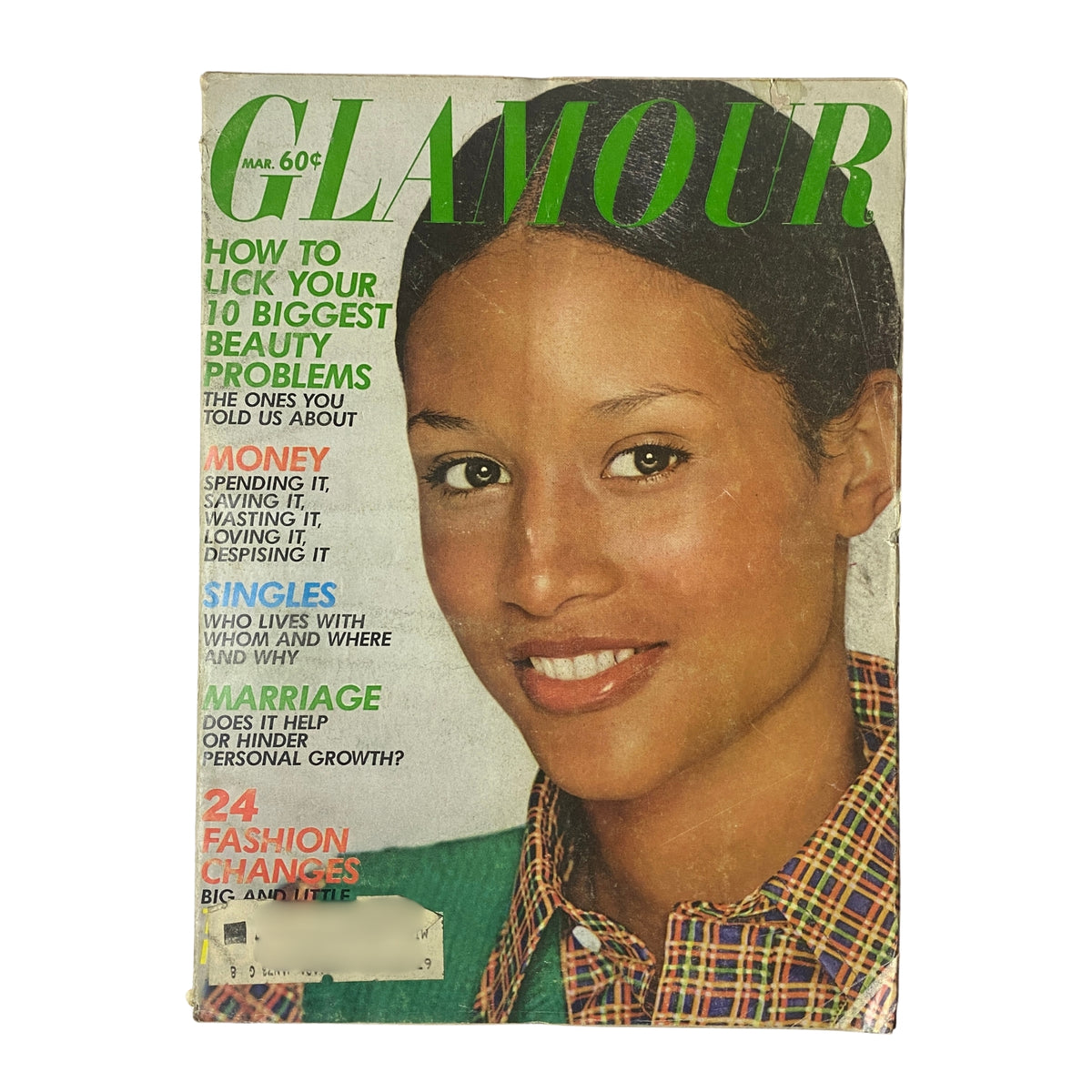 Cover of Glamour Magazine March 1972 featuring Beverly Johnson, photographed by Mike Reinhardt, showcasing beauty and fashion tips from the early 1970s.