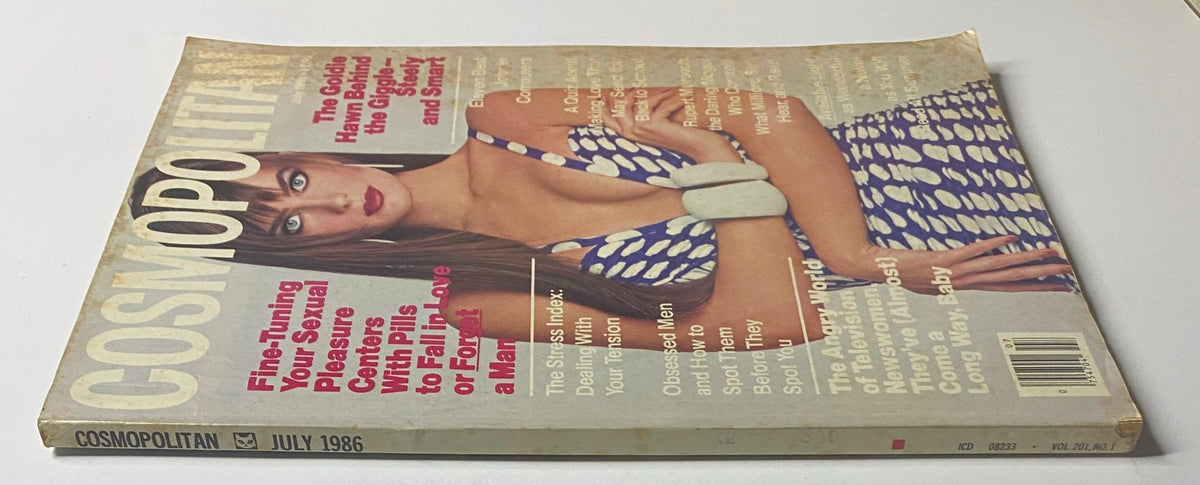Side view of the July 1986 Cosmopolitan Magazine with Paulina Porizkova on the cover, displaying vintage magazine wear and graphics.