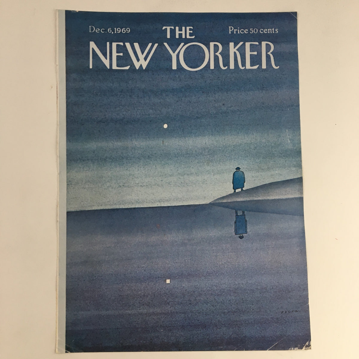Vintage cover of The New Yorker magazine from December 6, 1969, featuring a serene blue theme illustrated by Jean-Michel Folon, highlighting a reflective landscape with a solitary figure standing by the water.