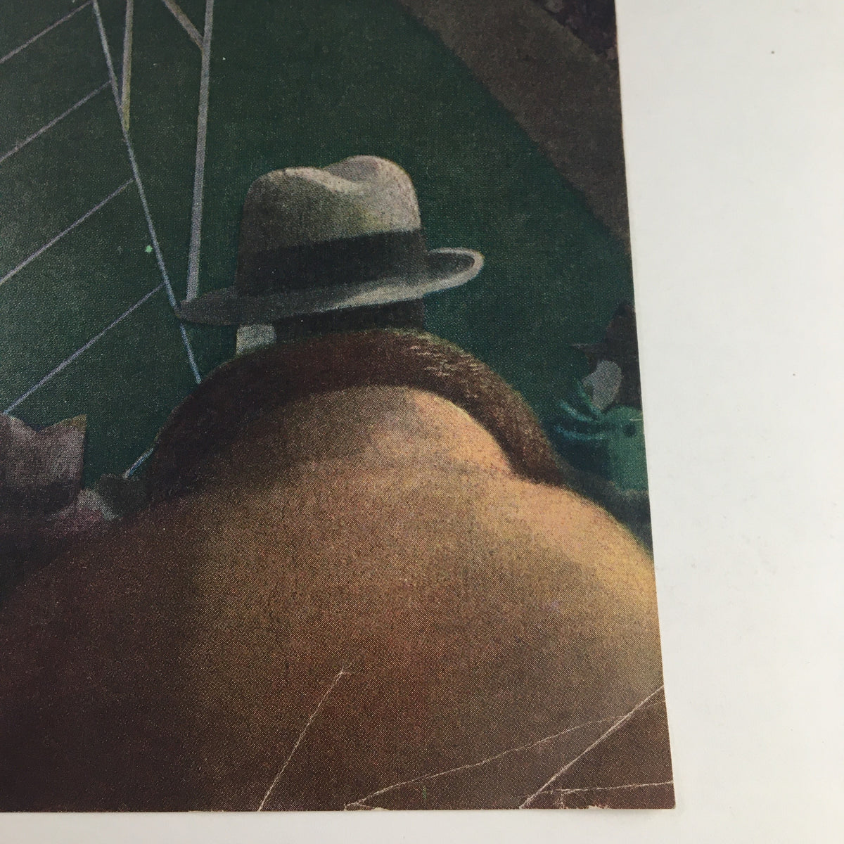 Detail of The New Yorker cover dated November 19, 1955 by Charles E. Martin, emphasizing a spectator in a hat watching a game on the field.