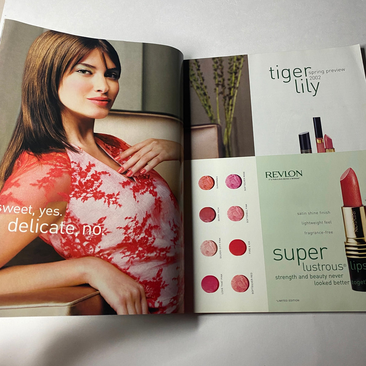 Advertisement from Vogue Magazine January 2002 for Revlon's spring collection, featuring makeup products with the title 'Vogue Magazine January 2002' appearing contextually.
