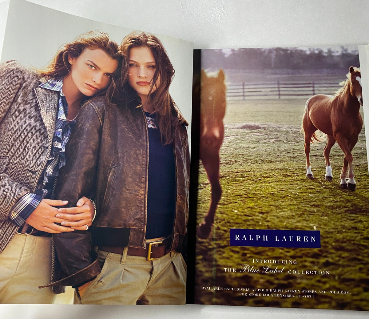 Ralph Lauren advertisement featuring two models in equestrian-inspired attire, set against a horse ranch backdrop. Vogue Magazine – August 2002 – Jennifer Aniston Cover (No Label, Very Good Condition).