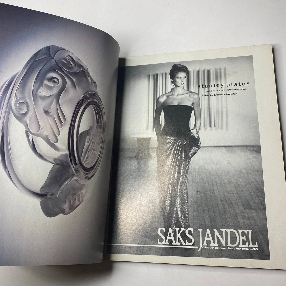 An advertisement featuring a glamorous model in a black strapless dress showcasing sparkling silver sequins, from the Town & Country Magazine October 1986 issue with Courtney Regan on the cover.