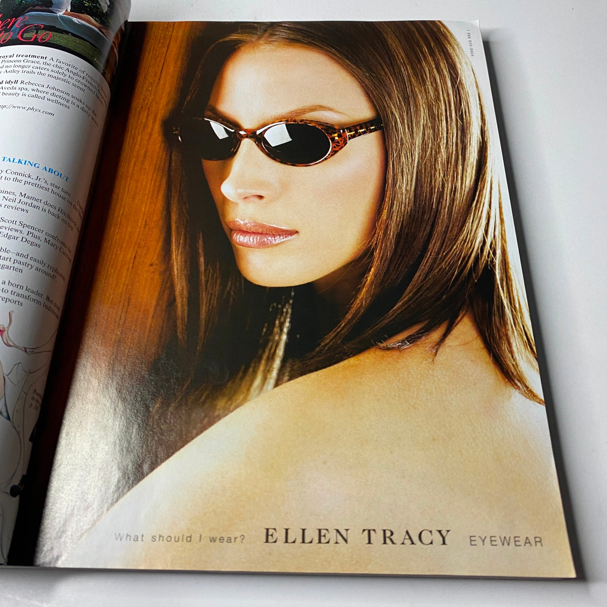 Advertisement from Vogue Magazine April 1998 featuring model promoting Ellen Tracy eyewear with stylish sunglasses. Vogue Magazine April 1998 Amber Valletta Cover No Label VG.