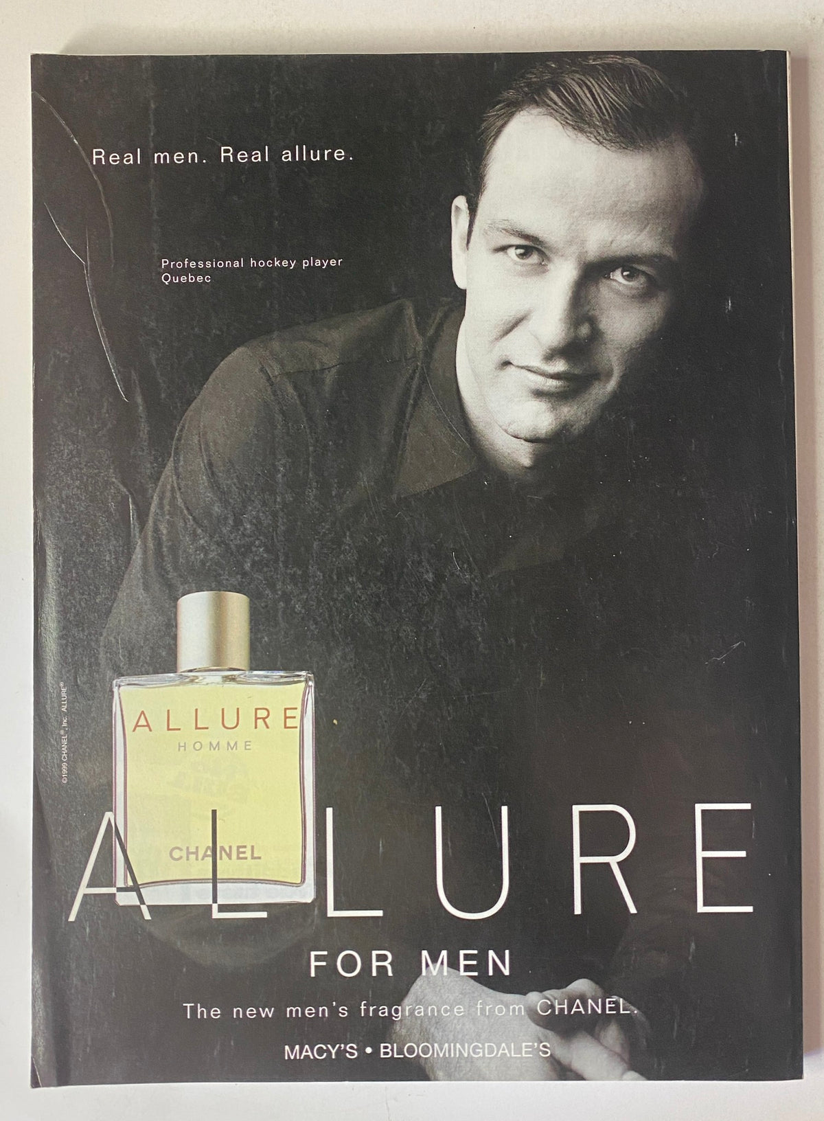 Vogue Magazine June 1999 advertisement for Chanel's Allure for Men, featuring a handsome male model and promoting luxury fragrances.