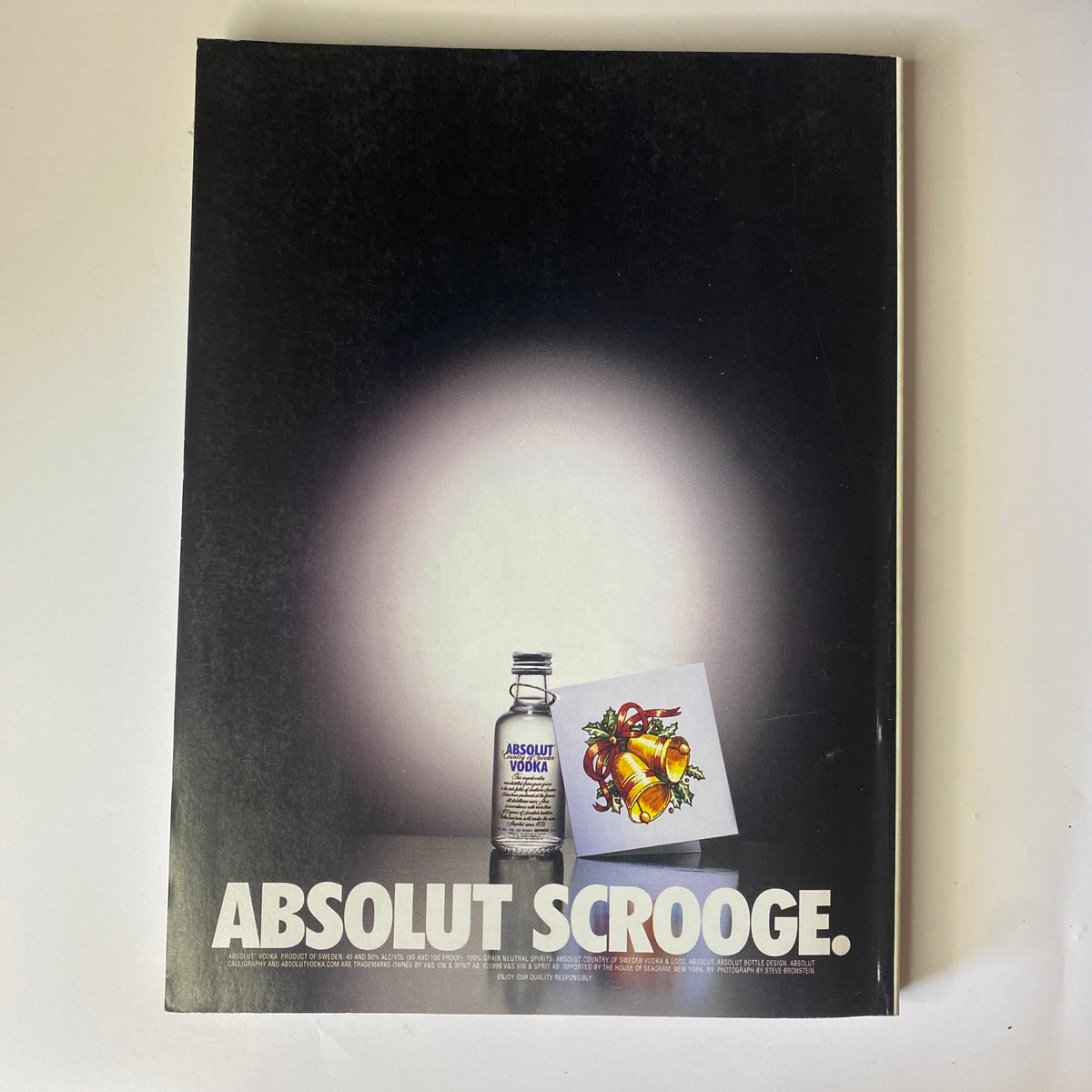 Vogue Magazine December 1998 advertisement for Absolut Vodka featuring a minimalist artistic design, promoting the signature drink with a seasonal twist.