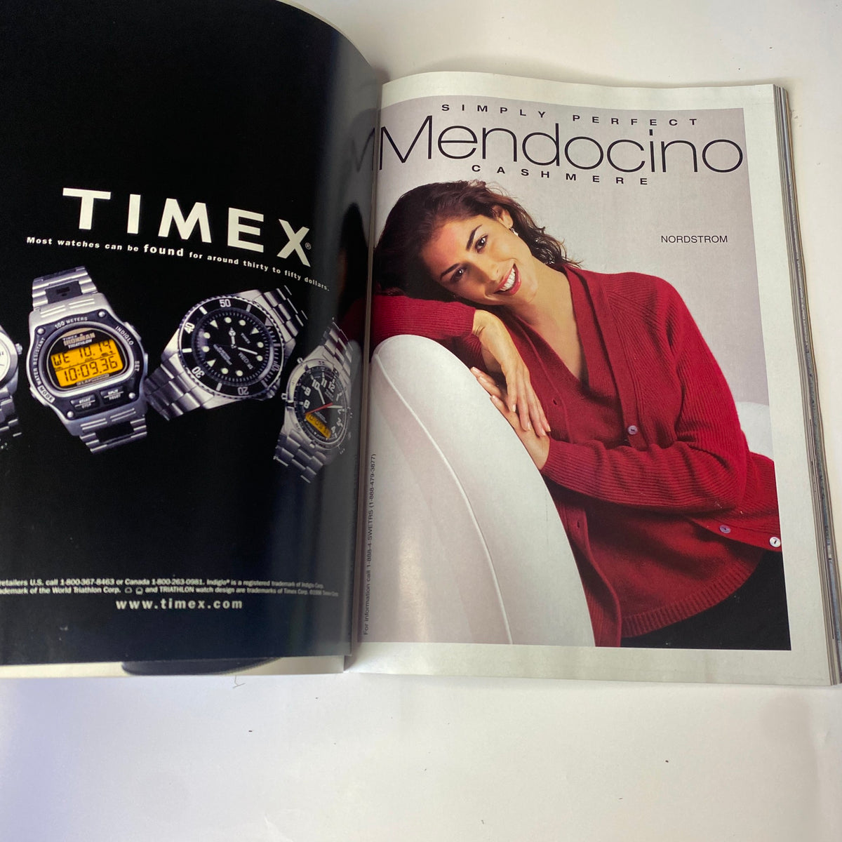 Vogue Magazine November 1998 featuring jewelry advertisement for Timex along with a model in a cashmere sweater from Mendocino, showcasing fashion trends and accessories of the late 1990s.