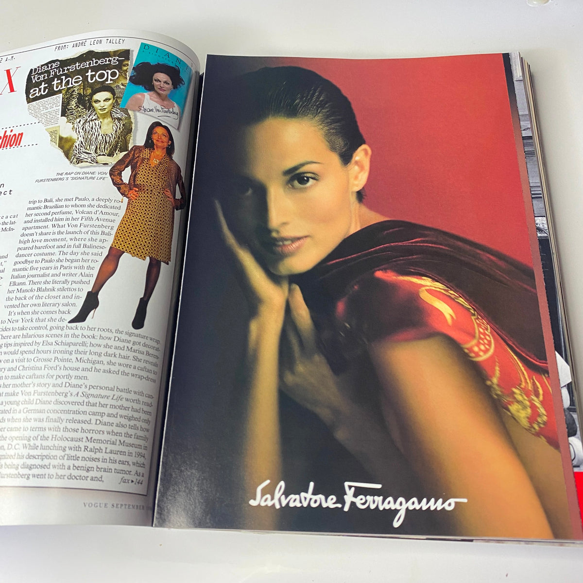 Vogue Magazine September 1998 displaying a striking advertisement for Salvatore Ferragamo featuring a model in elegant fashion.