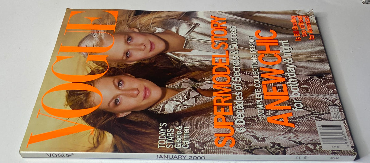 Vogue Magazine January 2000 cover featuring Gisele Bündchen and Carmen Kass styled in luxurious fashion, showcasing the supermodel era.