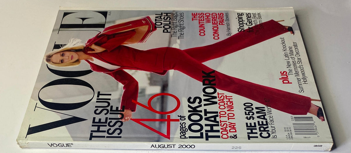 Vogue Magazine August 2000 Carmen Kass Cover, showcasing a stylish model in a bold red suit with a sophisticated pose, The Suit Issue, in Very Good Condition.
