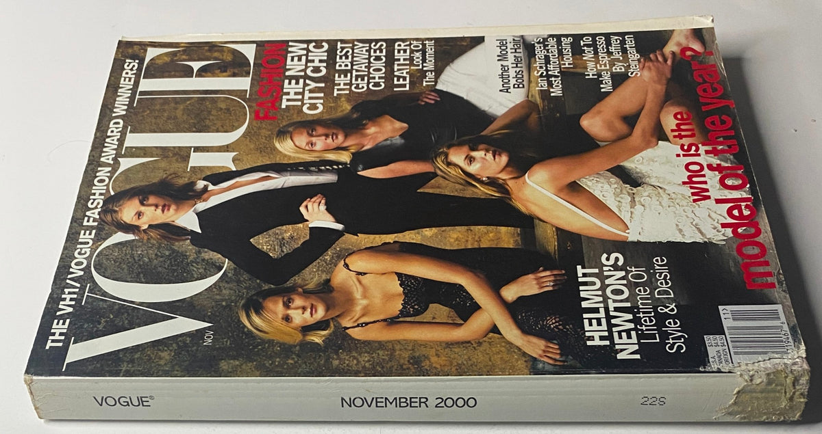 Side view of Vogue Magazine November 2000 showcasing a worn cover with models Carmen Kass, Angela Lindvall, Frankie Rayder, and Maggie Rizer, focused on fashion insights and VH1/Vogue Fashion Awards. Good condition despite minor edge wear.