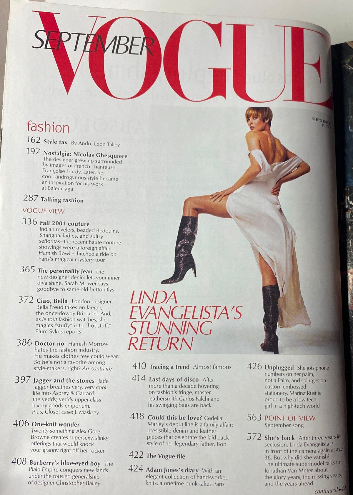 Inside pages of Vogue Magazine September 2001 highlight key sections including fashion and Linda Evangelista’s return, detailing fashion trends and designer features.