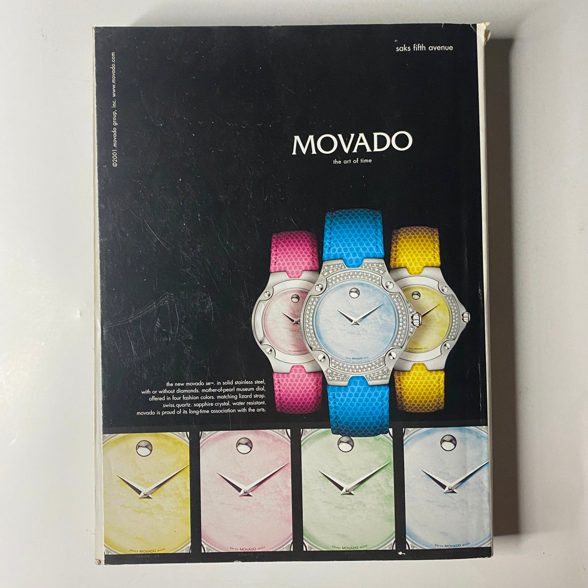 The back cover of Vogue Magazine September 2001 displays a vibrant advertisement for Movado watches, featuring a variety of colorful timepieces that showcase modern design and elegance.