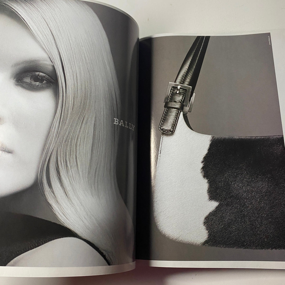 Vogue Magazine March 2000 Amber Valletta Cover, featuring a stunning black and white editorial spread showcasing fashion accessories by Bally.