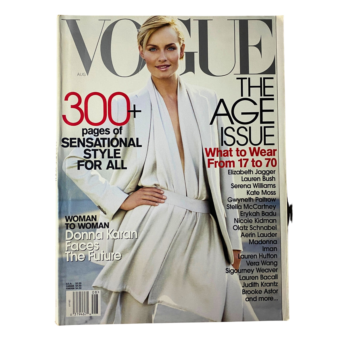 Vogue Magazine August 2001 featuring Amber Valletta on the cover, showcasing her in a white outfit. The cover highlights the theme 'The Age Issue' with a focus on style for all ages.