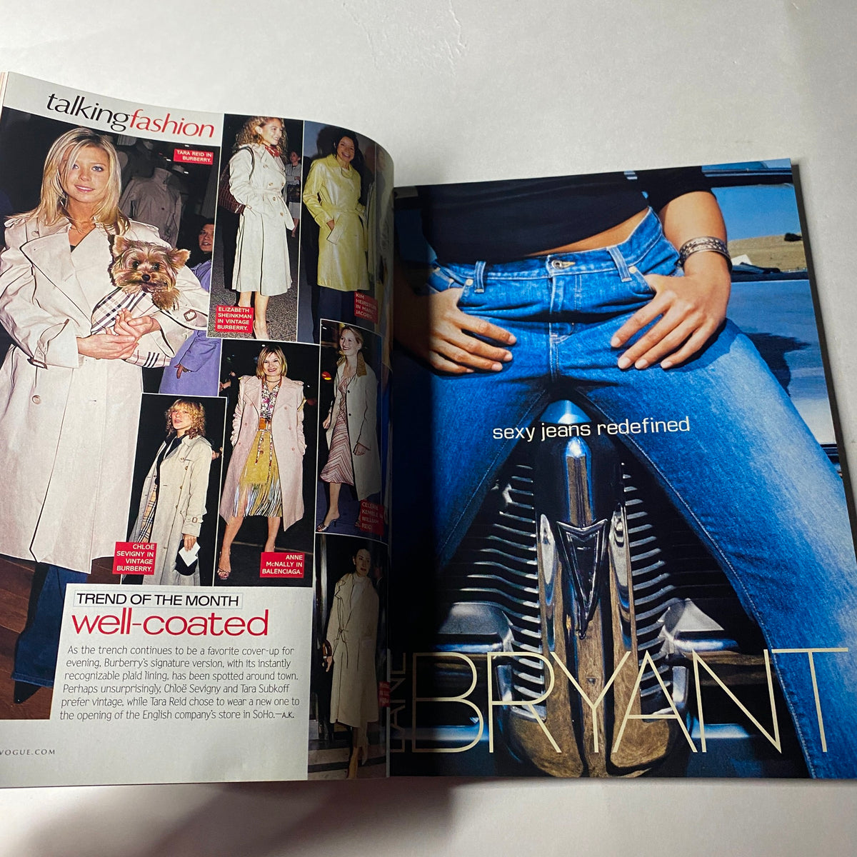 Page from Vogue Magazine July 2002 showcasing fashion trends, featuring 'sexy jeans redefined' along with images of models in stylish outfits.