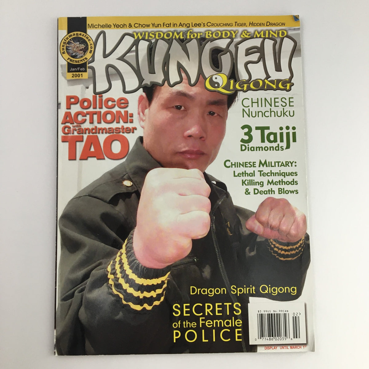 Kung Fu Qigong Magazine January 2001 cover featuring Grandmaster Alexander Tao in a fighting stance, showcasing martial arts themes and articles on training techniques and philosophy.